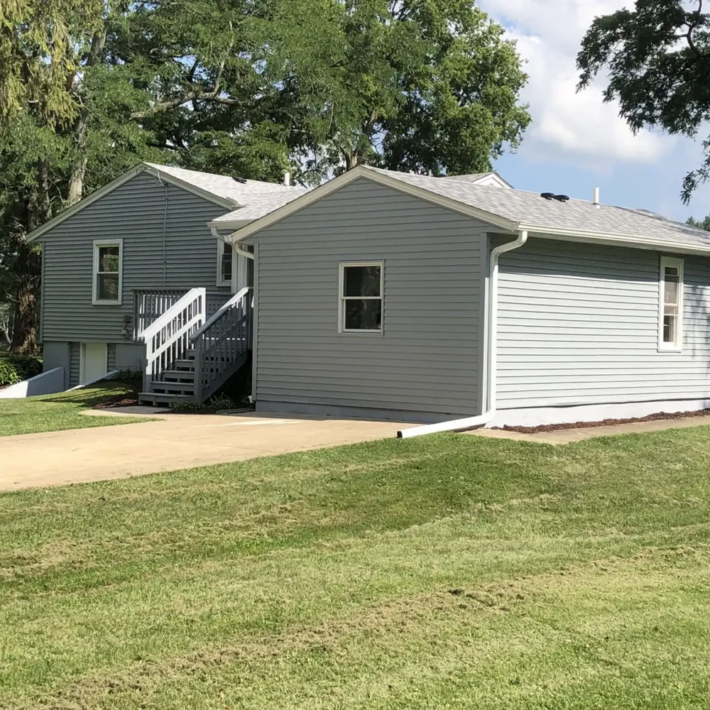 Modern Midwest Home Addition with Custom Roofing and Siding